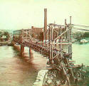 Temporary flow line bridge over Kaw River