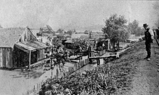 The Kansas side, before  tracks were covered and houses were carried away.